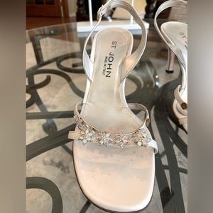 Elegant St John heels. Swarofski crystal flowers over the straps.  3.5” heels